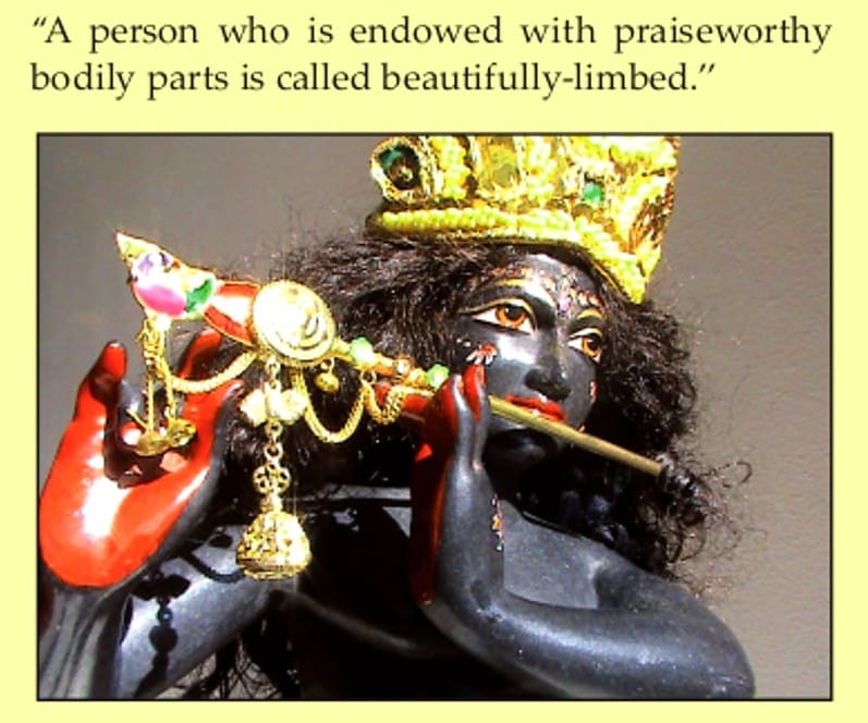 deity of krishna with flute